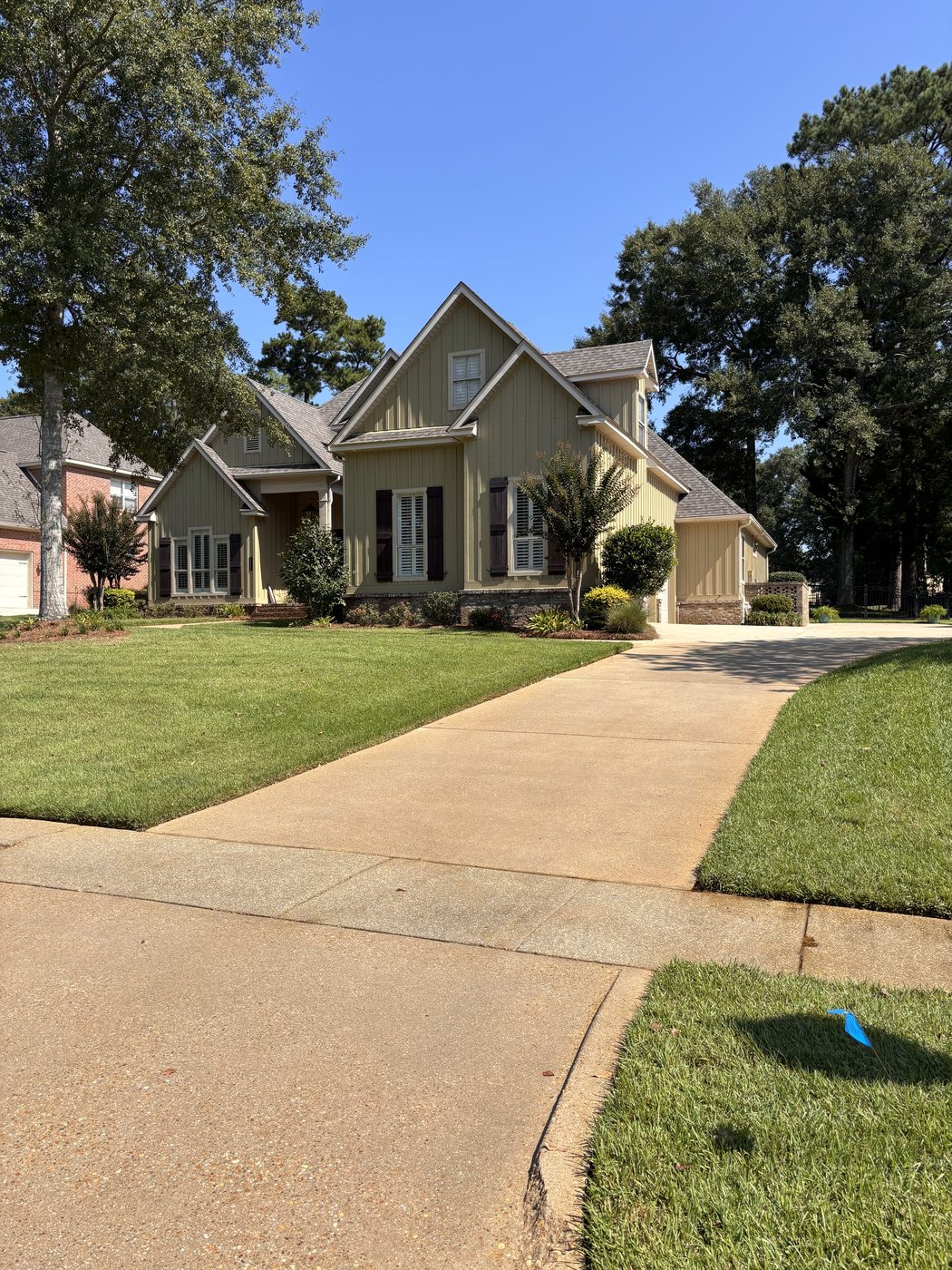 Clean driveway after pressure washing in Spanish Fort, AL