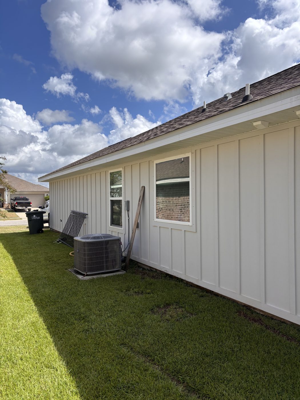Clean board-and-batten siding after soft washing in Daphne, AL